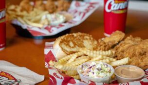 Louisiana-based Raising Cane's is known for its chicken fingers, crinkle-cut fries, Texas toast, coleslaw and signature “Cane’s Sauce.”