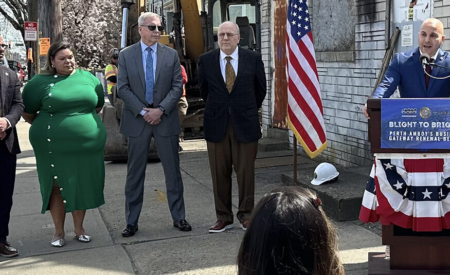 Perth Amboy Mayor Helmin Caba, at the podium, celebrates the start to Gateway project work on Smith Street April 9, 2024. - PROVIDED BY THE CITY OF PERTH AMBOY