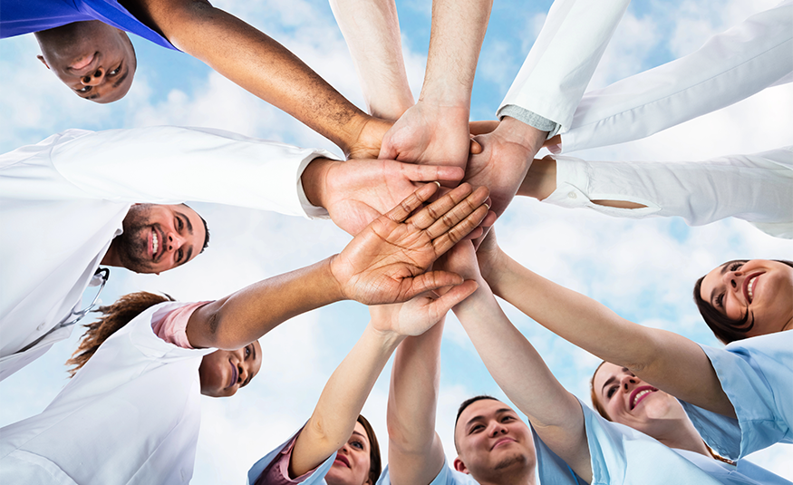 Diverse Medical Team Staff Hands Stack Outdoors