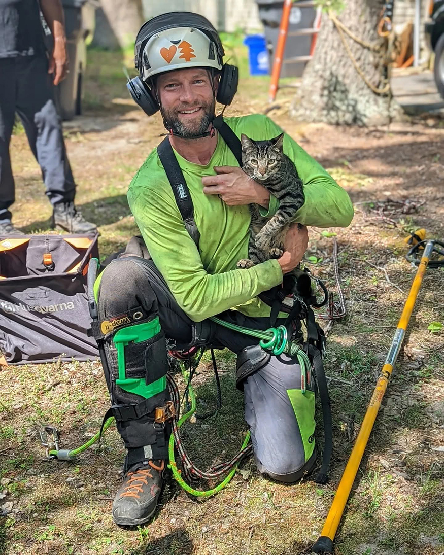Steven Murrow, a licensed arborist from Pitman and the owner of Tesla Tree Service, uses his professional tree-climbing skills to retrieve cats stuck in tall trees – at no cost.