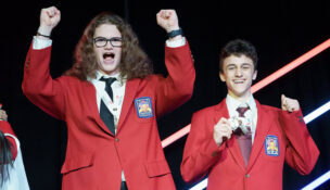 Peter Stout (left) and Scott Turner (right_, recent graduates of the Mercer County Technical Schools STEM Academy, celebrate winning a gold medal at the national SkillsUSA event in the Interactive Application and Video Game Development category.
